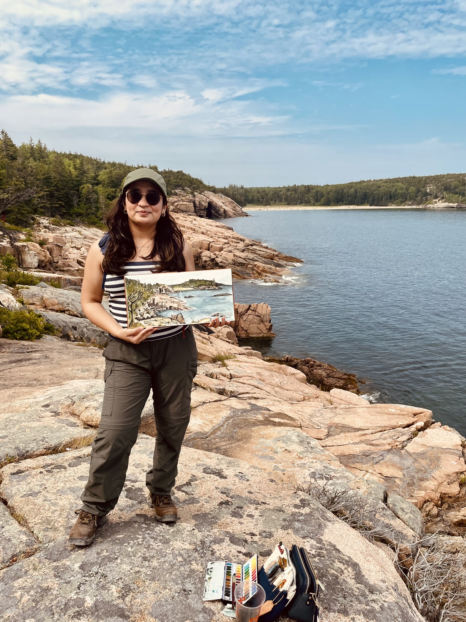 Host Tanu with sketchbook in Acadia